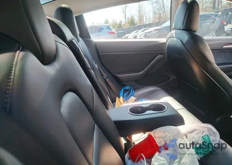 2021 Tesla Model 3 z USA, uszkodzony, nr VIN 5YJ3E1EB8MF060954